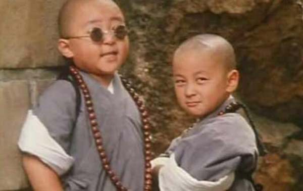 旋风小子中来自的插曲叫什么?歌词中有圆圆大光头,扁扁小馒头